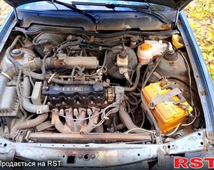 Сірий Деу Нексія, об'ємом двигуна 1.5 л та пробігом 487 тис. км за 1000 $, фото 1 на Automoto.ua