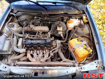 Сірий Деу Нексія, об'ємом двигуна 1.5 л та пробігом 487 тис. км за 1000 $, фото 1 на Automoto.ua