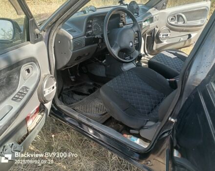 Синій Деу Нексія, об'ємом двигуна 1.5 л та пробігом 225 тис. км за 1448 $, фото 7 на Automoto.ua