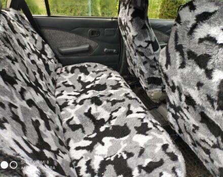 Синий Дэу Нексия, объемом двигателя 1.5 л и пробегом 234 тыс. км за 699 $, фото 3 на Automoto.ua