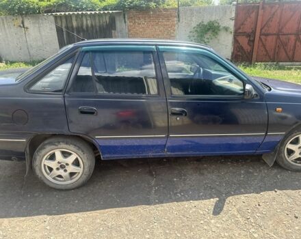 Синий Дэу Нексия, объемом двигателя 1.5 л и пробегом 300 тыс. км за 1547 $, фото 2 на Automoto.ua