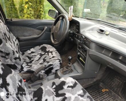 Синий Дэу Нексия, объемом двигателя 1.5 л и пробегом 234 тыс. км за 699 $, фото 2 на Automoto.ua