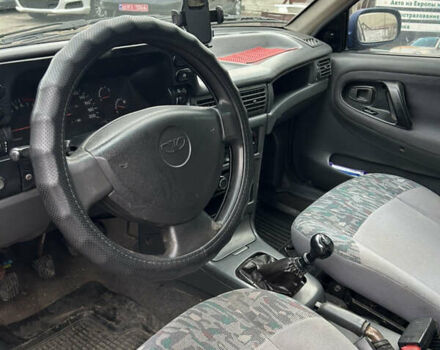 Синий Дэу Нексия, объемом двигателя 1.5 л и пробегом 237 тыс. км за 1500 $, фото 11 на Automoto.ua