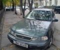 Синий Дэу Нексия, объемом двигателя 1.5 л и пробегом 257 тыс. км за 605 $, фото 1 на Automoto.ua