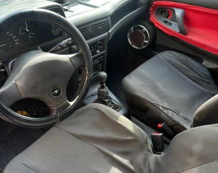 Синий Дэу Нексия, объемом двигателя 1.5 л и пробегом 200 тыс. км за 350 $, фото 6 на Automoto.ua