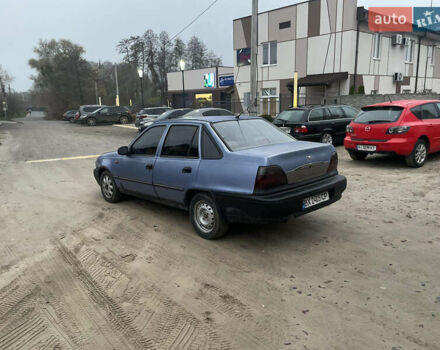 Синий Дэу Нексия, объемом двигателя 1.5 л и пробегом 300 тыс. км за 699 $, фото 1 на Automoto.ua