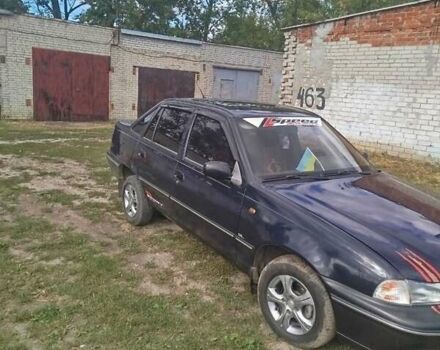 Синий Дэу Нексия, объемом двигателя 1.5 л и пробегом 240 тыс. км за 1500 $, фото 2 на Automoto.ua