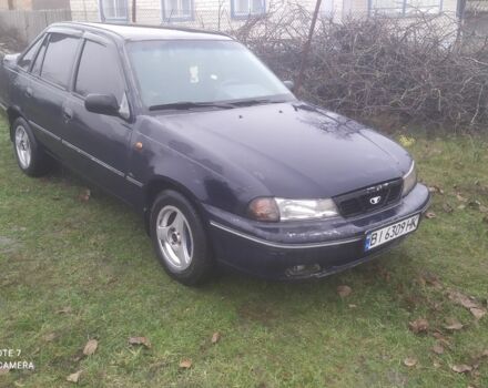 Синій Деу Нексія, об'ємом двигуна 1.5 л та пробігом 206 тис. км за 1800 $, фото 3 на Automoto.ua