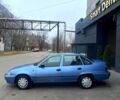 Синій Деу Нексія, об'ємом двигуна 1.5 л та пробігом 126 тис. км за 1999 $, фото 1 на Automoto.ua