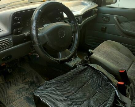 Синий Дэу Нексия, объемом двигателя 1.5 л и пробегом 228 тыс. км за 750 $, фото 11 на Automoto.ua