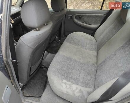 Синий Дэу Нексия, объемом двигателя 1.5 л и пробегом 227 тыс. км за 800 $, фото 3 на Automoto.ua