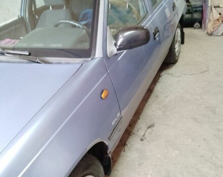 Синій Деу Нексія, об'ємом двигуна 1.5 л та пробігом 255 тис. км за 1500 $, фото 4 на Automoto.ua