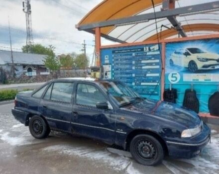 Синий Дэу Нексия, объемом двигателя 1.5 л и пробегом 355 тыс. км за 500 $, фото 3 на Automoto.ua
