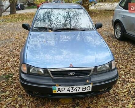 Синій Деу Нексія, об'ємом двигуна 1.5 л та пробігом 246 тис. км за 2000 $, фото 1 на Automoto.ua