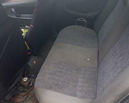 Синій Деу Нексія, об'ємом двигуна 1.5 л та пробігом 200 тис. км за 1000 $, фото 4 на Automoto.ua