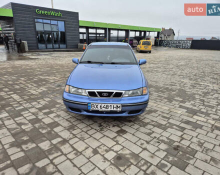 Синий Дэу Нексия, объемом двигателя 1.5 л и пробегом 242 тыс. км за 1999 $, фото 4 на Automoto.ua