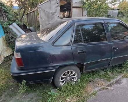 Синий Дэу Нексия, объемом двигателя 1.5 л и пробегом 218 тыс. км за 1100 $, фото 1 на Automoto.ua