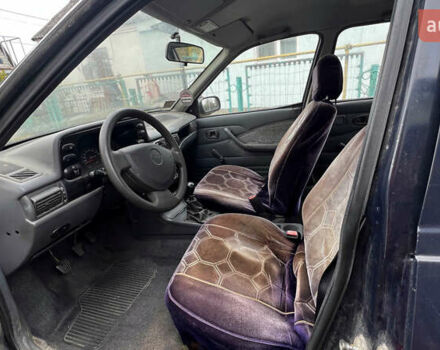 Синий Дэу Нексия, объемом двигателя 1.5 л и пробегом 140 тыс. км за 1300 $, фото 1 на Automoto.ua