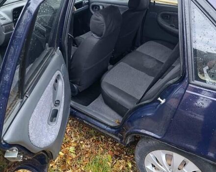 Синій Деу Нексія, об'ємом двигуна 1.5 л та пробігом 153 тис. км за 1450 $, фото 8 на Automoto.ua