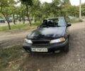 Синій Деу Нексія, об'ємом двигуна 1.5 л та пробігом 269 тис. км за 1201 $, фото 1 на Automoto.ua
