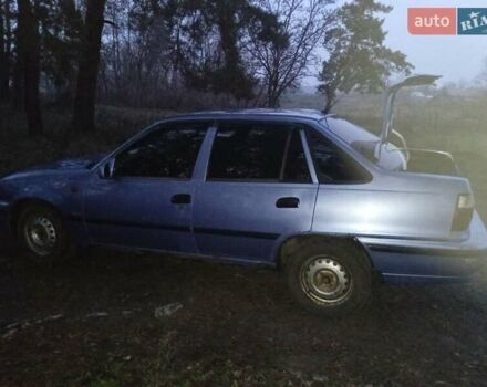 Синій Деу Нексія, об'ємом двигуна 1.5 л та пробігом 281 тис. км за 700 $, фото 2 на Automoto.ua