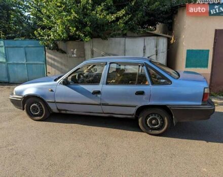 Синій Деу Нексія, об'ємом двигуна 1.5 л та пробігом 156 тис. км за 2000 $, фото 1 на Automoto.ua