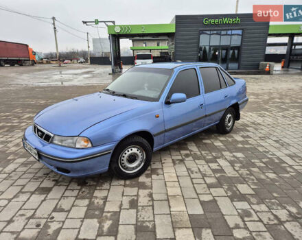 Синий Дэу Нексия, объемом двигателя 1.5 л и пробегом 242 тыс. км за 1999 $, фото 2 на Automoto.ua