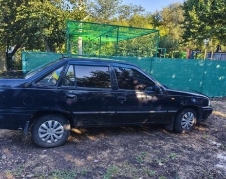 Синий Дэу Нексия, объемом двигателя 1.5 л и пробегом 204 тыс. км за 1500 $, фото 1 на Automoto.ua