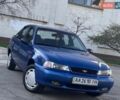 Синій Деу Нексія, об'ємом двигуна 1.5 л та пробігом 120 тис. км за 1999 $, фото 1 на Automoto.ua