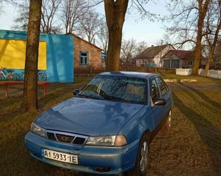 Синій Деу Нексія, об'ємом двигуна 1.5 л та пробігом 187 тис. км за 1233 $, фото 1 на Automoto.ua