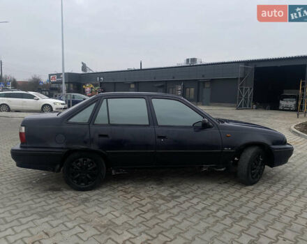 Синій Деу Нексія, об'ємом двигуна 1.5 л та пробігом 176 тис. км за 1300 $, фото 5 на Automoto.ua