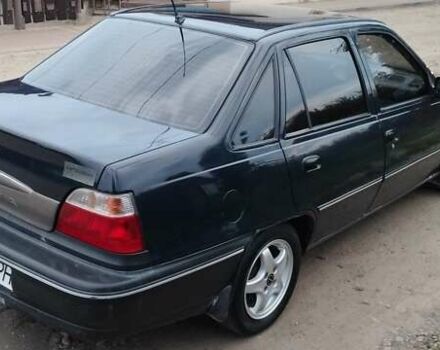 Синій Деу Нексія, об'ємом двигуна 1.5 л та пробігом 218 тис. км за 1650 $, фото 5 на Automoto.ua