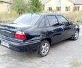 Синий Дэу Нексия, объемом двигателя 1.5 л и пробегом 179 тыс. км за 2500 $, фото 3 на Automoto.ua