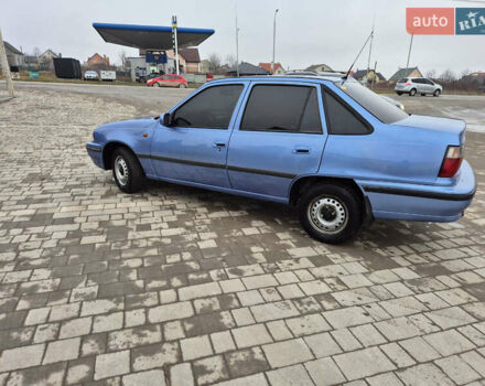 Синий Дэу Нексия, объемом двигателя 1.5 л и пробегом 242 тыс. км за 1999 $, фото 12 на Automoto.ua