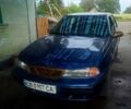 Синий Дэу Нексия, объемом двигателя 1.5 л и пробегом 303 тыс. км за 600 $, фото 1 на Automoto.ua