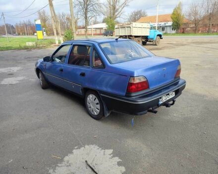 Синий Дэу Нексия, объемом двигателя 1.5 л и пробегом 250 тыс. км за 1050 $, фото 4 на Automoto.ua