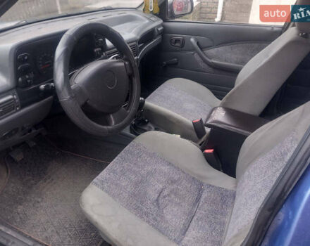 Синий Дэу Нексия, объемом двигателя 1.5 л и пробегом 189 тыс. км за 2400 $, фото 4 на Automoto.ua