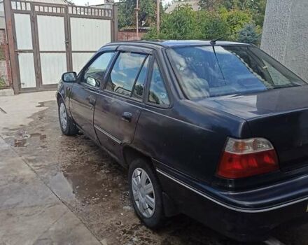 Синий Дэу Нексия, объемом двигателя 1.5 л и пробегом 287 тыс. км за 1300 $, фото 4 на Automoto.ua