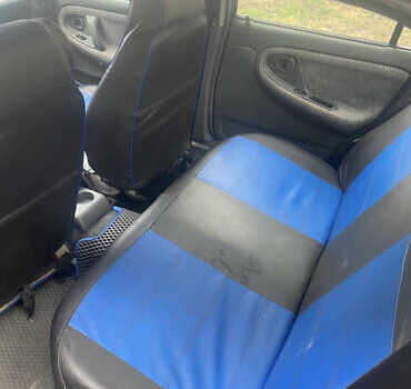 Синій Деу Нексія, об'ємом двигуна 1.5 л та пробігом 120 тис. км за 2250 $, фото 3 на Automoto.ua