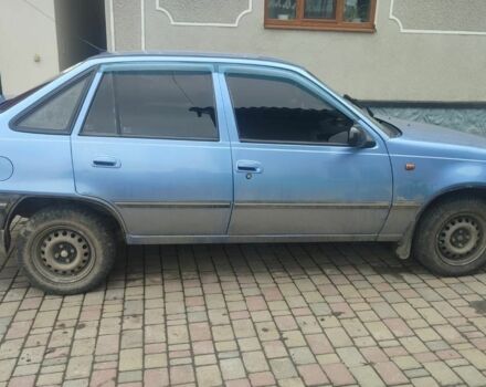 Синій Деу Нексія, об'ємом двигуна 1.5 л та пробігом 270 тис. км за 1500 $, фото 2 на Automoto.ua