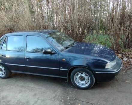 Синій Деу Нексія, об'ємом двигуна 1.5 л та пробігом 218 тис. км за 1650 $, фото 4 на Automoto.ua
