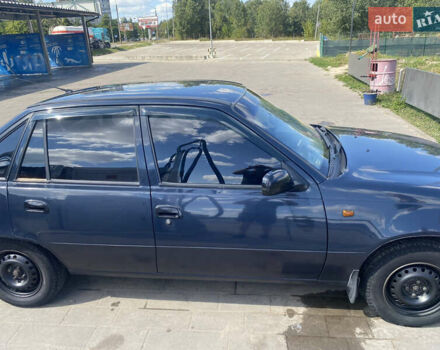 Синий Дэу Нексия, объемом двигателя 1.5 л и пробегом 161 тыс. км за 2100 $, фото 2 на Automoto.ua