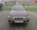 Синій Деу Нексія, об'ємом двигуна 1 л та пробігом 300 тис. км за 1800 $, фото 1 на Automoto.ua