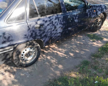 Синий Дэу Нексия, объемом двигателя 1.5 л и пробегом 205 тыс. км за 2100 $, фото 2 на Automoto.ua
