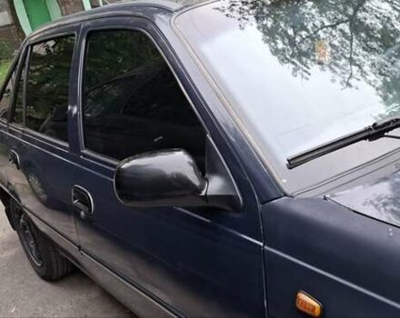 Синій Деу Нексія, об'ємом двигуна 1.5 л та пробігом 124 тис. км за 2300 $, фото 10 на Automoto.ua
