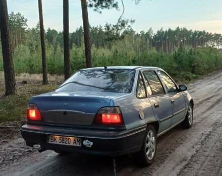 Синій Деу Нексія, об'ємом двигуна 1.5 л та пробігом 270 тис. км за 1200 $, фото 3 на Automoto.ua