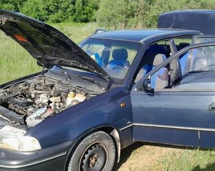 Синій Деу Нексія, об'ємом двигуна 1.5 л та пробігом 293 тис. км за 1600 $, фото 2 на Automoto.ua