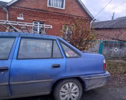 Синій Деу Нексія, об'ємом двигуна 1.5 л та пробігом 186 тис. км за 1300 $, фото 1 на Automoto.ua