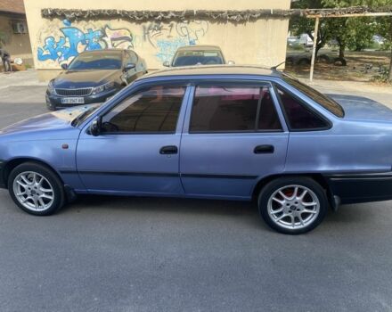 Синій Деу Нексія, об'ємом двигуна 1.5 л та пробігом 240 тис. км за 1800 $, фото 3 на Automoto.ua