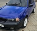Синий Дэу Нексия, объемом двигателя 1.5 л и пробегом 230 тыс. км за 2500 $, фото 2 на Automoto.ua